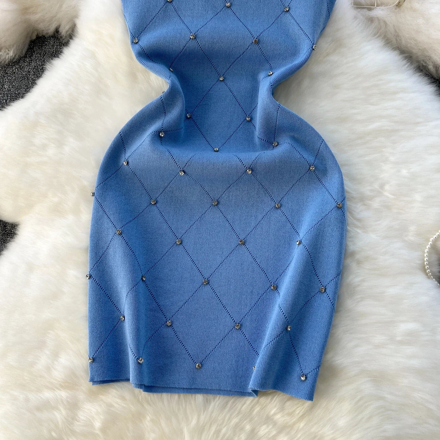 Dames jurk in zachte pastelkleuren