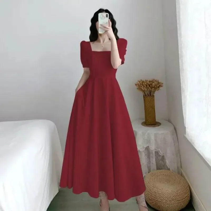 Dames jurk in zachte pastelkleuren